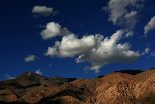 Puffy Clouds over Ladakh Range of Mountains