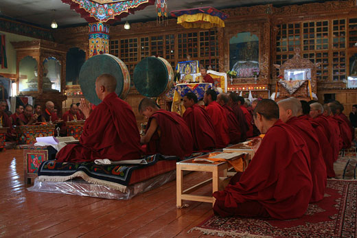 monks performing a puja at soma gompa
